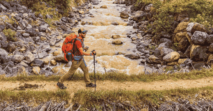 mystery ranch bridger 65l eric in peru by a river backpackingtv