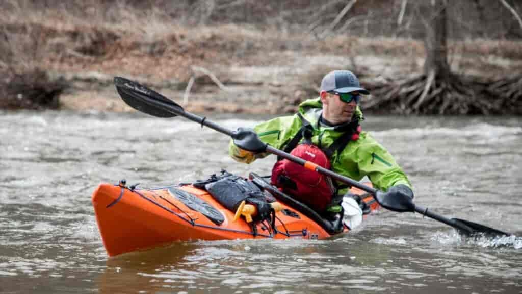 kayak paddle length for a narrow touring kayak can be shorter than what is needed for a sit-on-top kayak that is really wide.