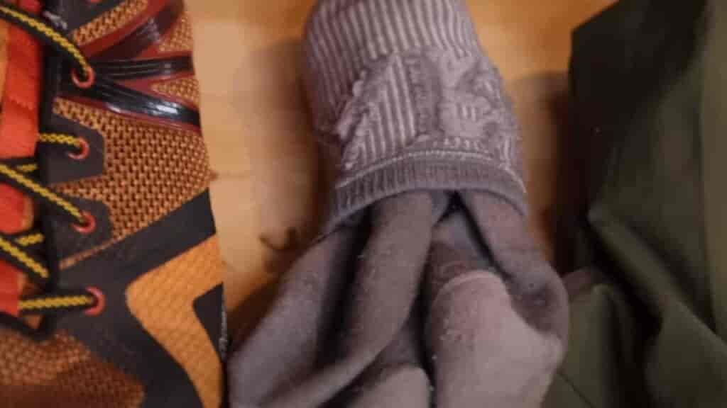 Invest in NON-cotton socks as a day hiking essential piece of gear.