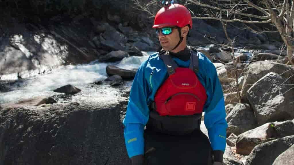 On whitewater runs, with a cold splashing inevitable all day, and with the need to wear a skirt, the dry top is the best paddling tops choice.