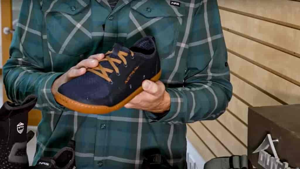 Kayaking Shoes, like this Astral river shoe, stay on your feet when swimming.