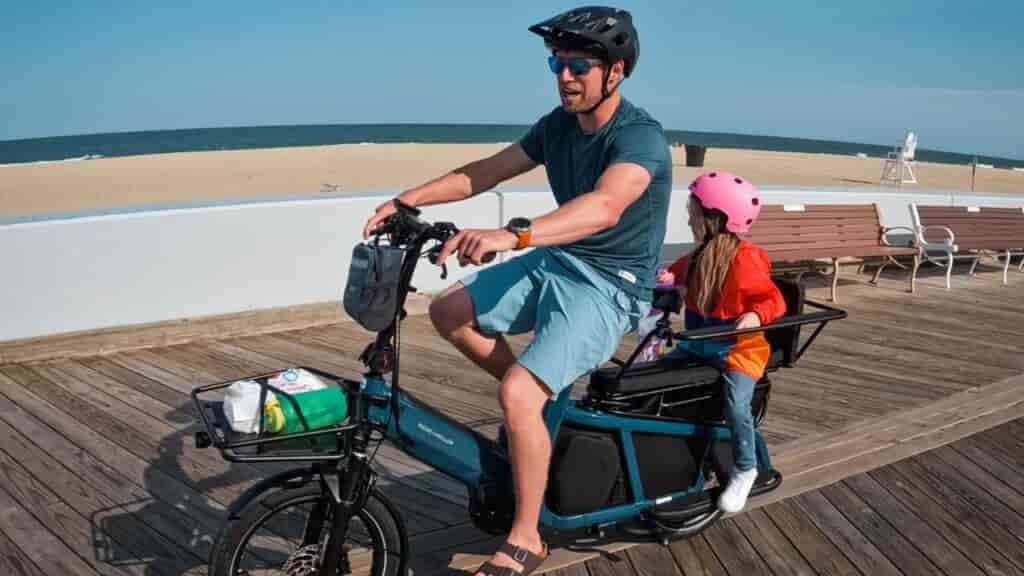 Parker definitely sees the benefits of biking when she gets the comfy seat behind dad!