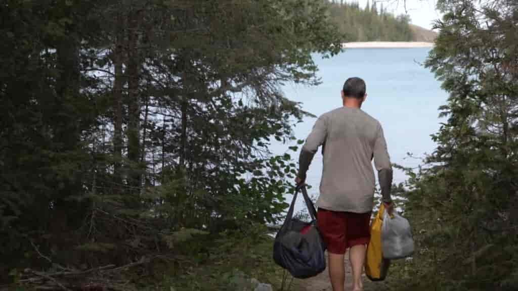 kayak camping , Ken carrying mesh bag